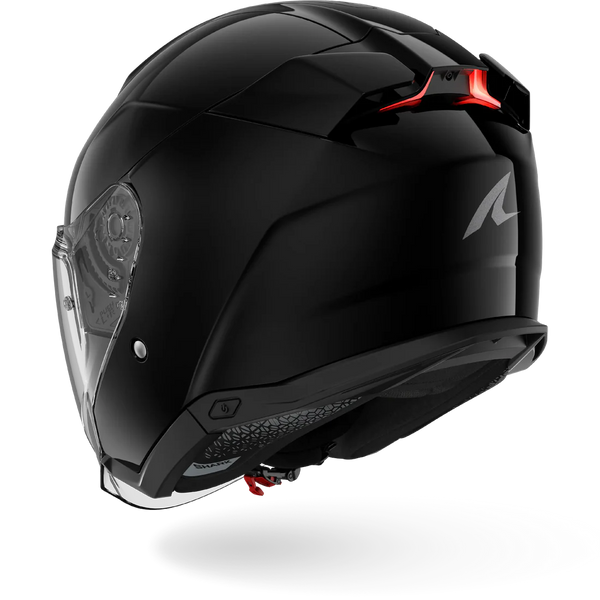 Black motorcycle helmet with a clear visor on a white background