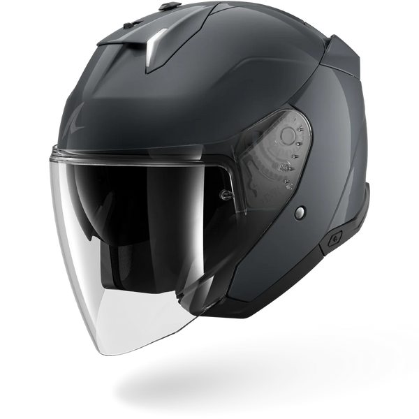 Black motorcycle helmet with clear visor on a white background
