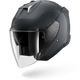 Black motorcycle helmet with clear visor on a white background
