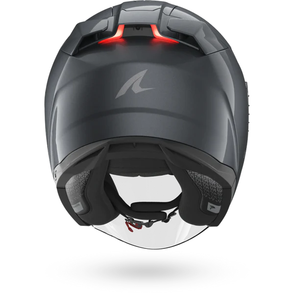 Black motorcycle helmet with clear visor on a white background