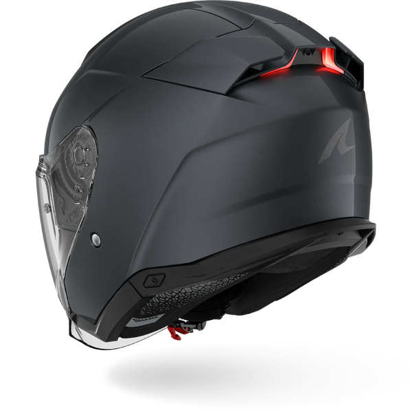 Black motorcycle helmet with clear visor on a white background