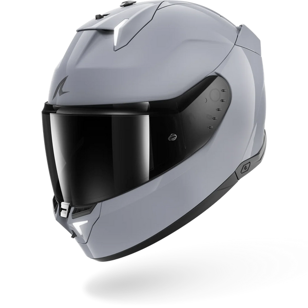 Gray motorcycle helmet with a reflective visor on a white background
