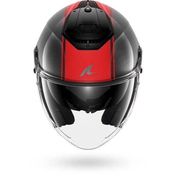 A carbon fiber full-face motorcycle helmet with a vibrant red stripe down the center, a silver stylized 'Shark' logo on the forehead, and a clear visor, shown against a plain white background.
