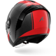 A red and black carbon fiber motorcycle helmet with a clear visor, shown at a three-quarter angle on a white background.